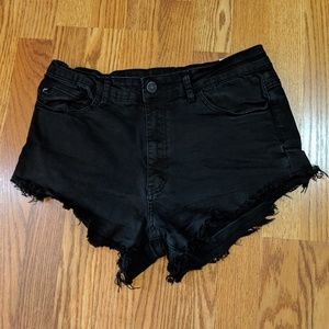 Black distressed shorts